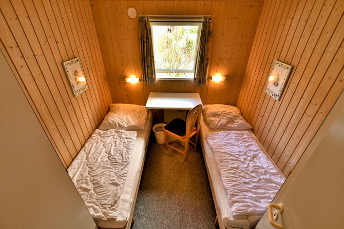 Ferienhaus in Pelzerhaken - Ferienhaus Typ C im Ferienpark AM WALDRAND - Schlafzimmer mit Einzelbetten