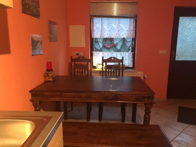 Ferienwohnung in Duvendiek - Ferienwohnung Storchenhof - K&uuml;che mit Sicht auf eigenen Grillplatz