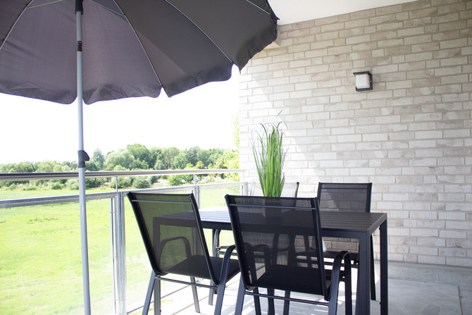 Ferienwohnung in Boltenhagen - Wei&szlig;e Villen Whg. 18 - &uuml;berdachter Balkon